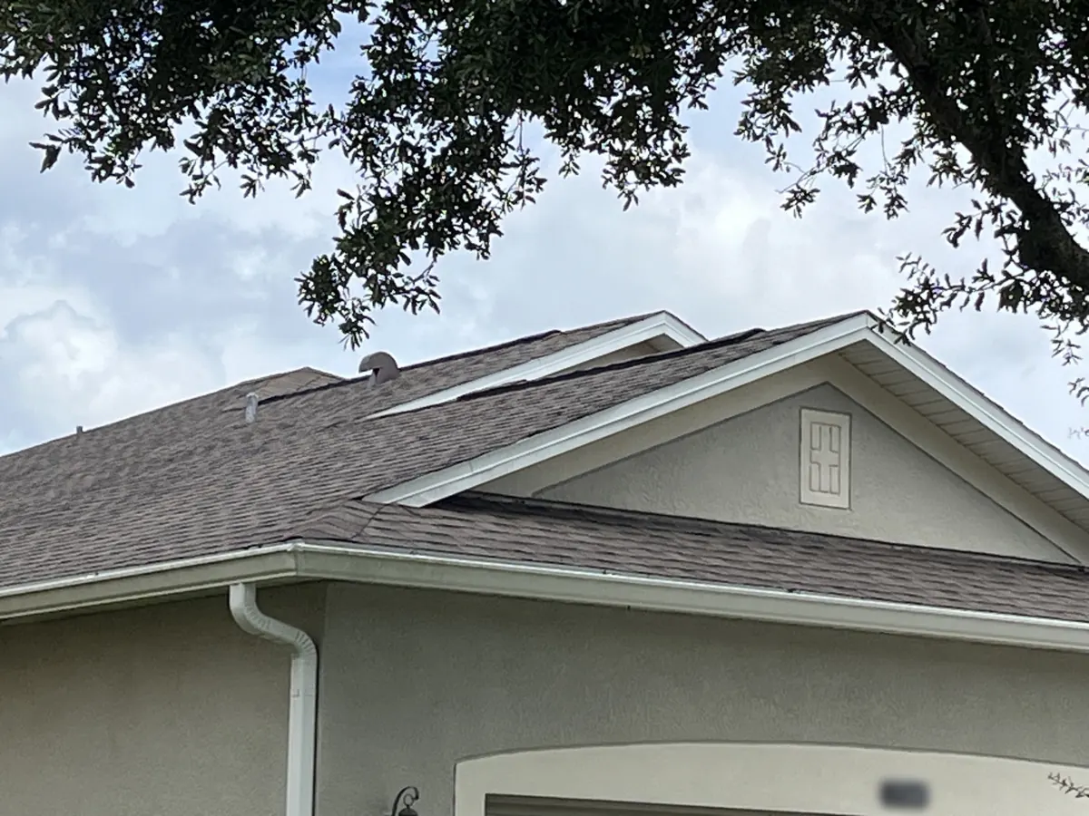 Architectural shingle roof and gable in Lake Pickett, FL by One World Roofing LLC