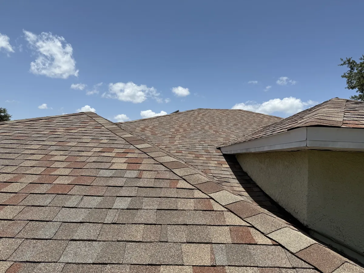 Blended architectural shingle roof in Winter Garden, FL by One World Roofing LLC